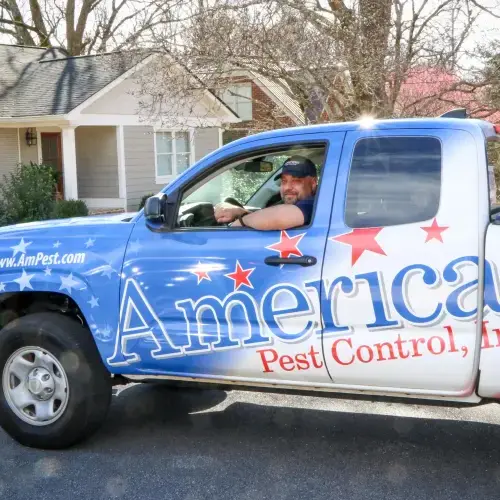 An American Pest Control, Inc. technician arrives at a customer's home